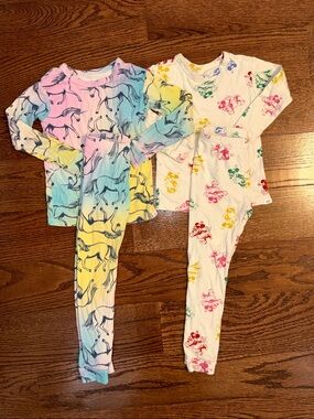 Size 5 girls bundle of 2 pairs of 2-piece pajamas from Baby Gap.